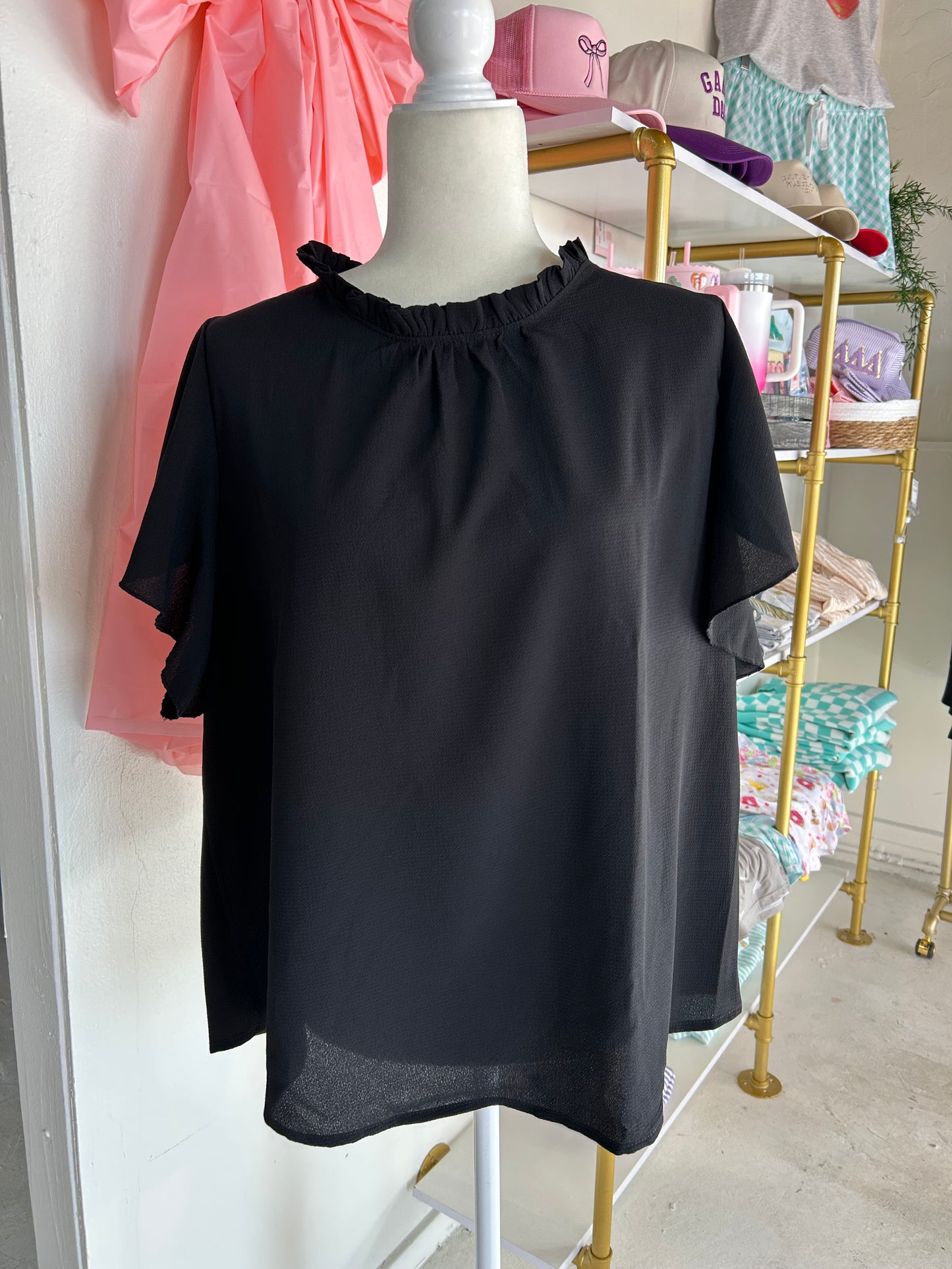 Black ruffle top