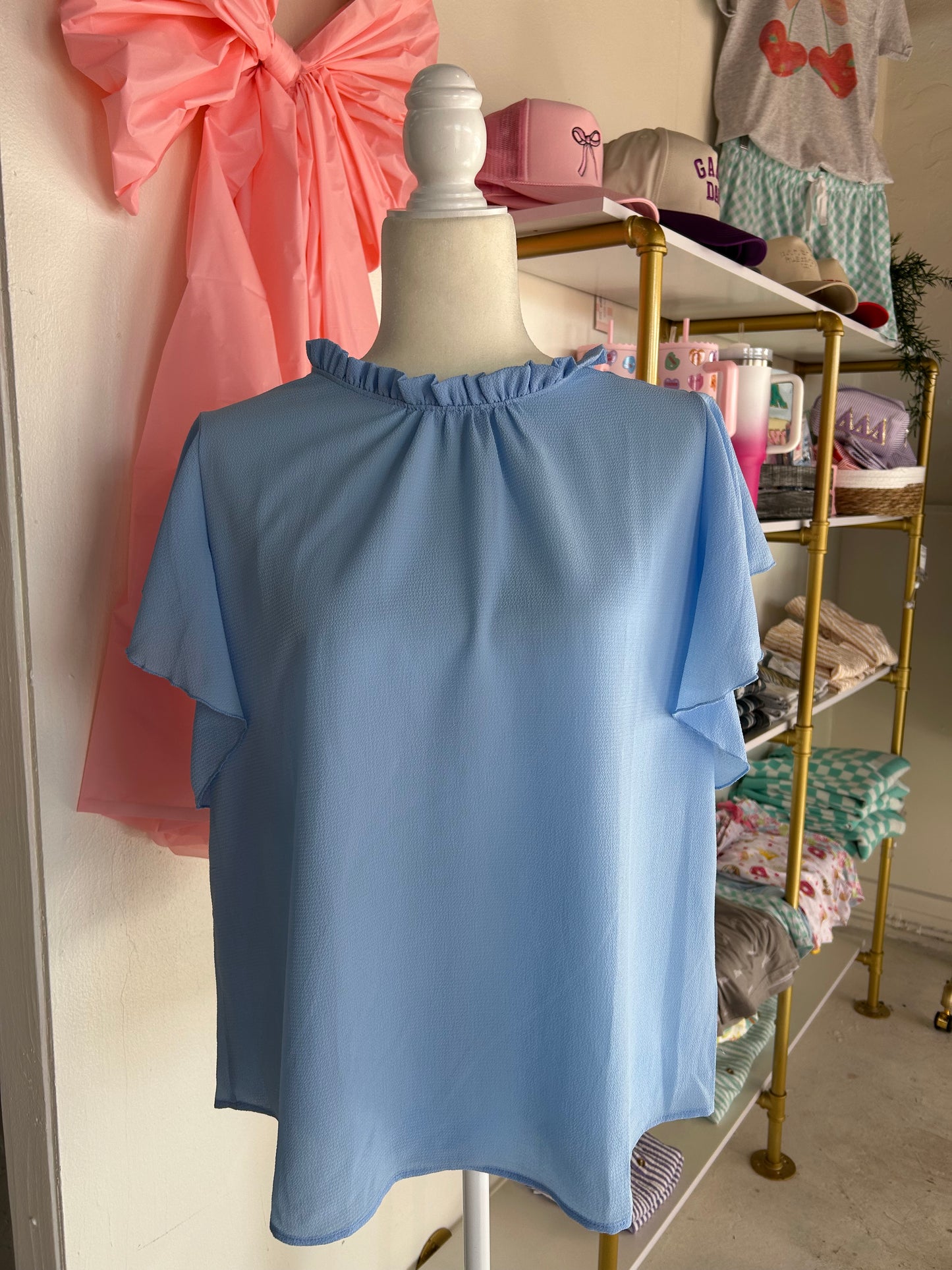 Blue ruffle top