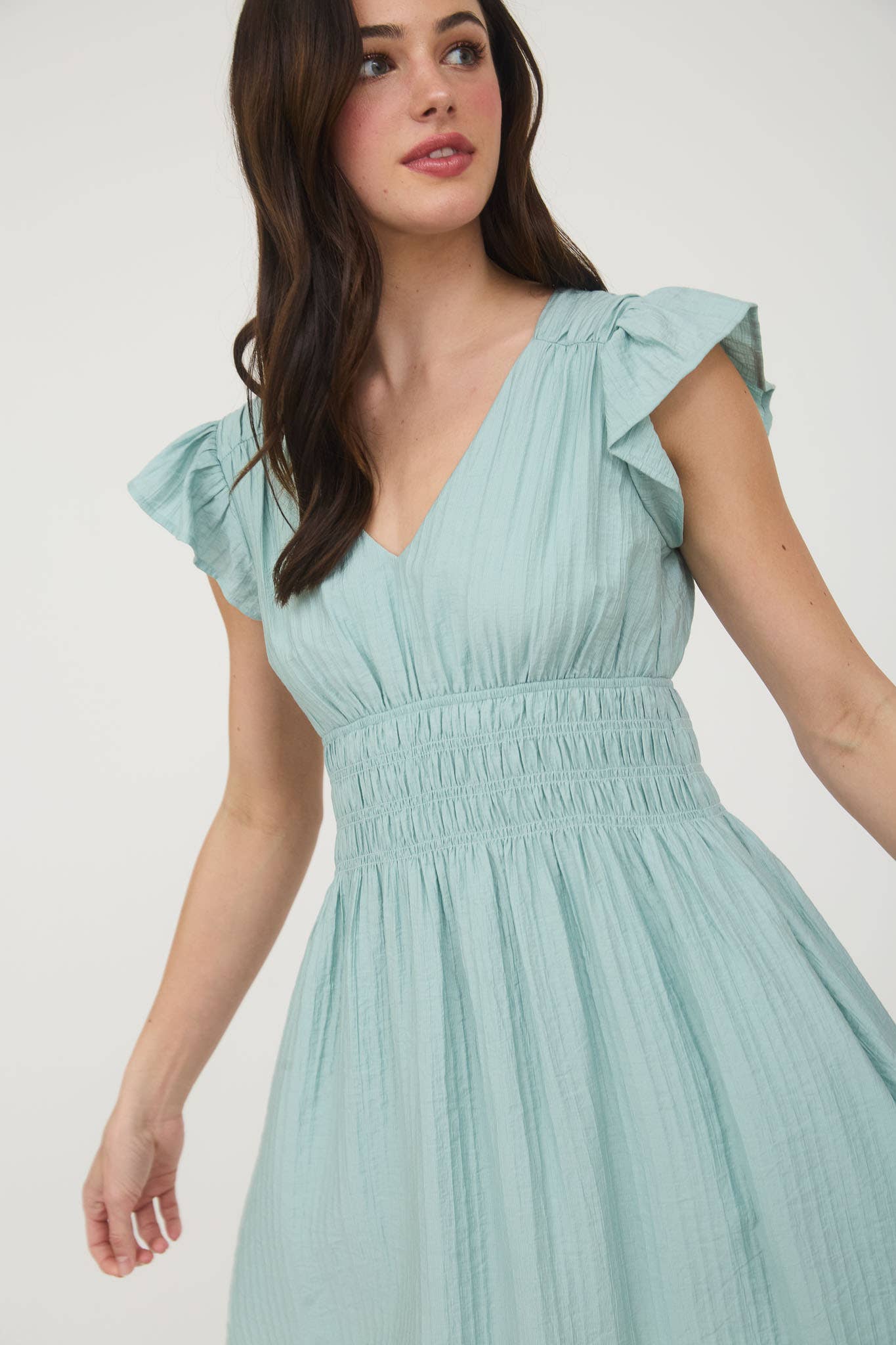 V NECK SHIRRED WAIST RUFFLE SLEEVE MINI DRESS