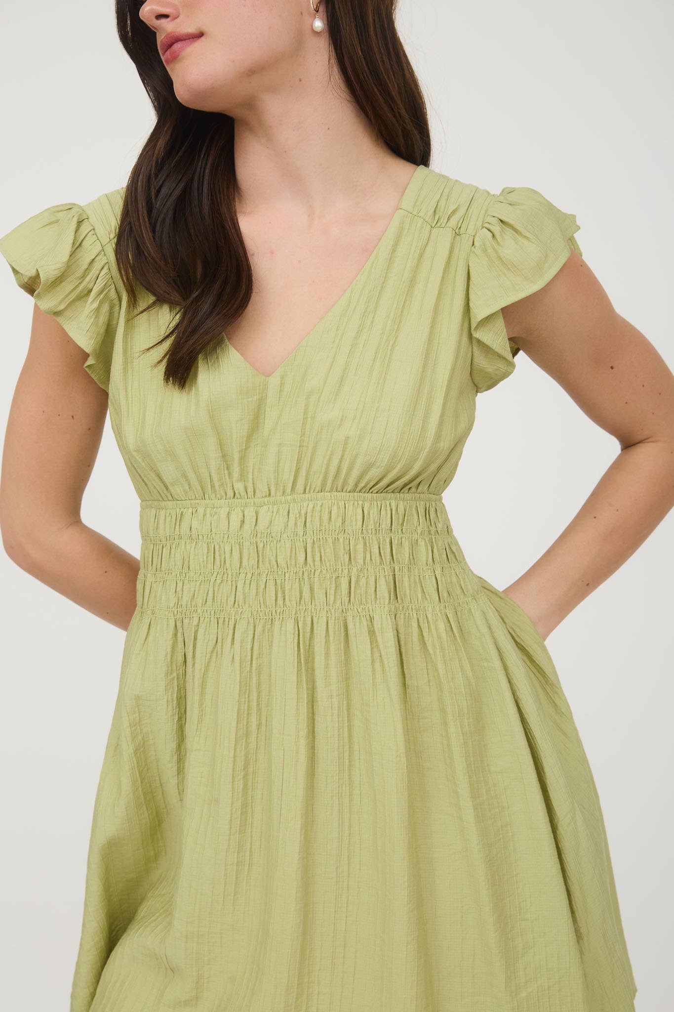 V NECK SHIRRED WAIST RUFFLE SLEEVE MINI DRESS